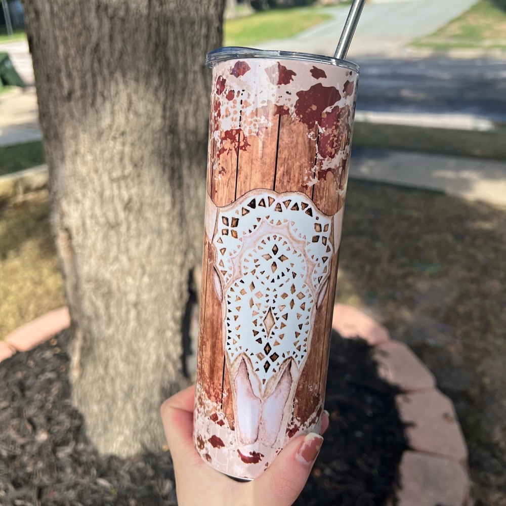 Western designed 20oz stainless steel tumbler with metal straw